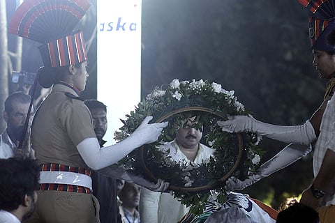 Police personnel lay a wreath on the mortal remains of veteran actor Nana Patekar during his cremation at his farmhouse at Donje village, in Pune district, late Thursday, Oct. 8, 2026. The last rites of the 75-year-old actor, who essayed many memorable roles on the silver screen, were performed with full state honours amid the chants of "Nana Amar Rahe" (Long Live Nana). 