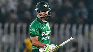Anjum Naveed/AP Photo : Pakistan's Sahibzada Farhan celebrates after scoring fifty during the first T20 cricket match between Pakistan and Sri Lanka, in Rawalpindi, Pakistan.