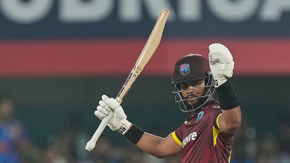 West Indies' captain Shai Hope celebrates his century during the second one-day international cricket match between India and West Indies in Guwahati, India, Wednesday, Sept. 30, 2026. - | Photo: AP/ Anupam Nath