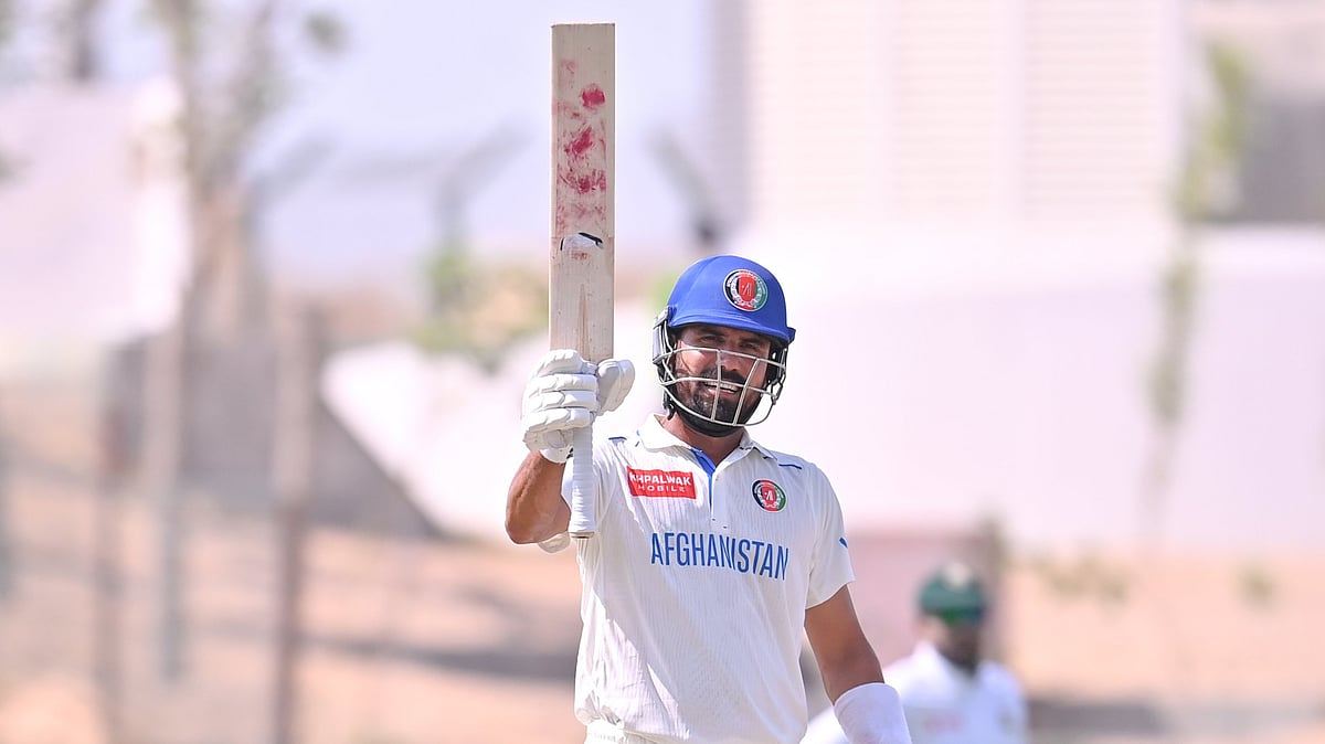 Abdul Malik scores half century against Bangladesh on second day of the one-off Test. - | Photo: X/@ACBofficials
