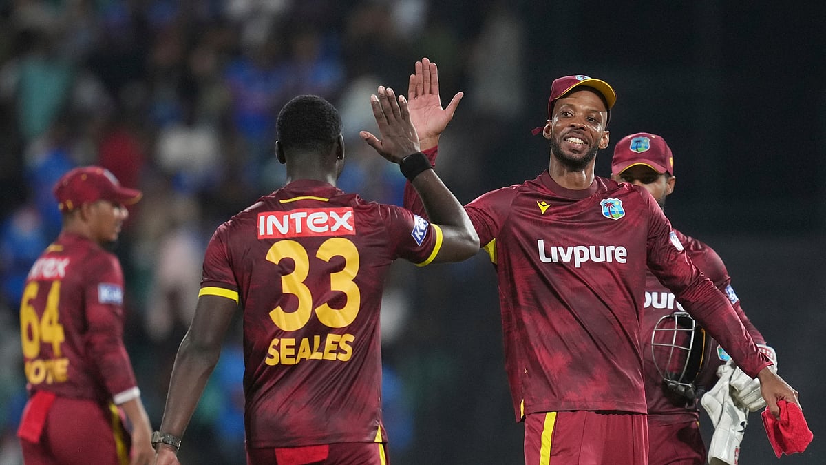 West Indies' Roston Chase, second right, celebrate the wicket of India's captain Shubman Gill during the first one day international cricket match between India and West Indies in Thiruvananthapuram, India, Sunday, Sept. 27, 2026. - (AP Photo/ Rafiq Maqbool)
