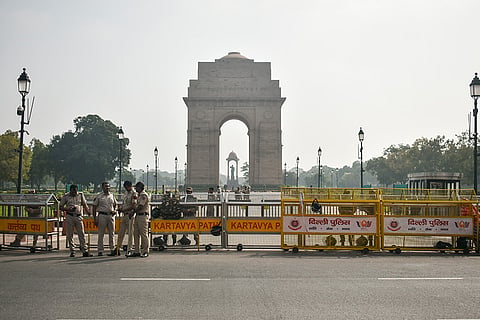 Security personnel keep vigil as heavy police deployment and entry restrictions are enforced ahead of a planned protest by Cockroach Janta Party (CJP) members against Chief Election Commissioner (CEC) Gyanesh Kumar, at India Gate in New Delhi.