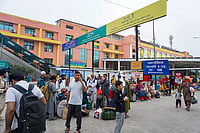 | Photo: PTI  : New Delhi: Passengers wait outside the New Delhi Railway Station amid heightened security arrangements following planned protests by the Cockroach Janta Party (CJP), in New Delhi.