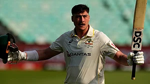 Themba Hadebe/AP Photo : Australia's Matt Renshaw raise his bat and helmet as he leaves the field after being dismissed for 190 runs on day two of the first cricket test match between South Africa and Australia, in Durban, South Africa.