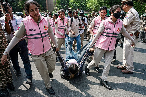 New Delhi: Police personnel detain Cockroach Janta Party (CJP) supporters demonstrating near the Gurudwara Bangla Sahib area ahead of a planned protest against Chief Election Commissioner (CEC) Gyanesh Kumar, in New Delhi, Saturday, Oct. 10, 2026.