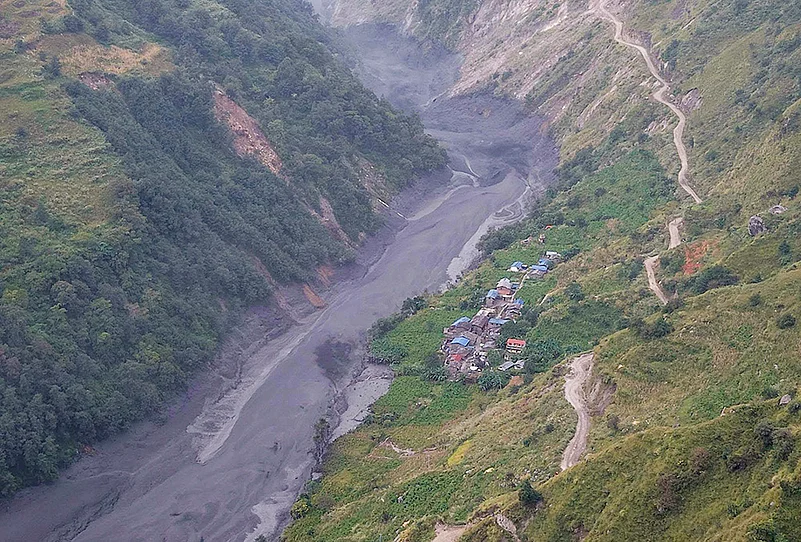 Photograph Risk Management In Photos: Nepal Flash Flood Sweeps Away Around 35 Houses, Several ...
