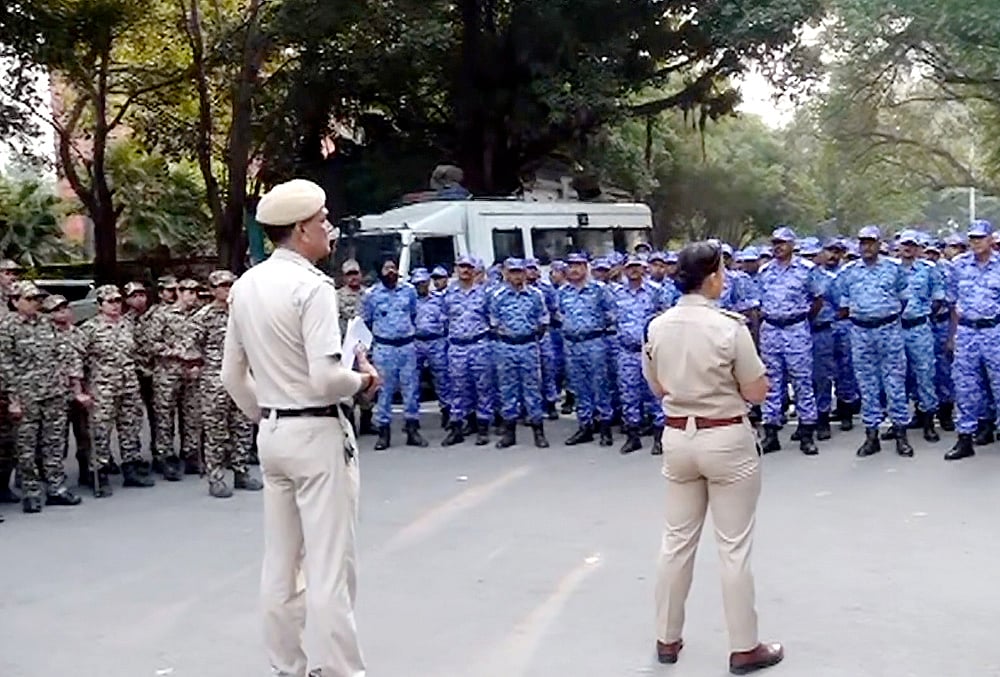 Security personnel stand guard near Jantar Mantar following continued demonstration calls by the Cockroach Janta Party (CJP) demanding the resignation of Chief Election Commissioner (CEC) Gyanesh Kumar, in New Delhi, Sunday, Oct. 11, 2026. 