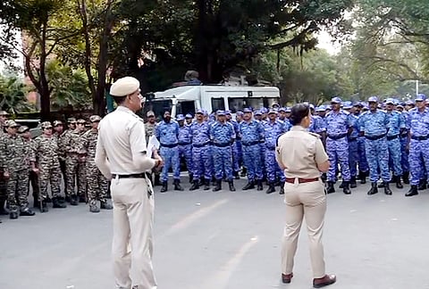 Security personnel stand guard near Jantar Mantar following continued demonstration calls by the Cockroach Janta Party (CJP) demanding the resignation of Chief Election Commissioner (CEC) Gyanesh Kumar, in New Delhi, Sunday, Oct. 11, 2026. 