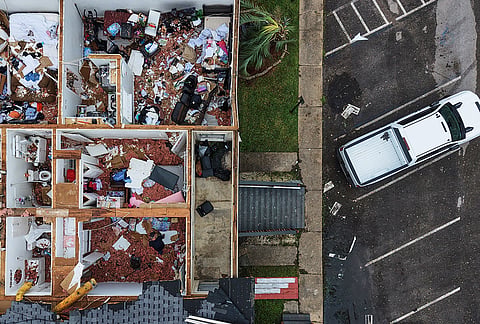 An apartment complex which had its roof ripped off is seen in the aftermath of Hurricane Isaias in Milton, Fla., Saturday, Oct. 10, 2026. 

