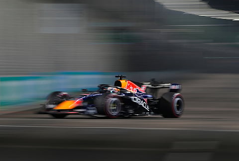 Red Bull driver Max Verstappen of the Netherlands steers his car during the qualifying session ahead of the Singapore Formula One Grand Prix in Singapore, Saturday, Oct. 10, 2026. 
