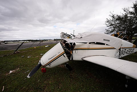 A damaged airplane is seen at Peter Prince Field in the aftermath of Hurricane Isaias in Milton, Florida, Saturday, Oct. 10, 2026. 
