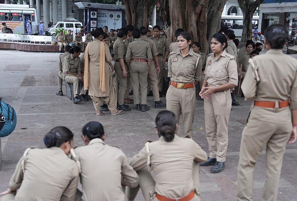 Security personnel keep vigil following continued demonstration calls by the Cockroach Janta Party (CJP) demanding the resignation of Chief Election Commissioner (CEC) Gyanesh Kumar, in New Delhi, Sunday, Oct. 11, 2026. 