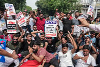 In Photos: Protests And Detentions Continue For Second Day Despite SC's Direction To Limit Police Action | Photo: PTI/Salman Ali : Activists of various student bodies shout slogans, at the Connaught Place area, amid continued demonstration calls by the Cockroach Janta Party (CJP) demanding the resignation of Chief Election Commissioner (CEC) Gyanesh Kumar, in New Delhi, Sunday, Oct. 11, 2026.