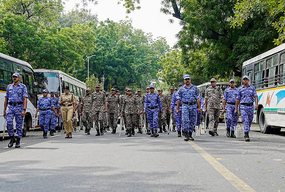 Security personnel keep vigil following continued demonstration calls by the Cockroach Janta Party (CJP) demanding the resignation of Chief Election Commissioner (CEC) Gyanesh Kumar, in New Delhi, Sunday, Oct. 11, 2026.  - | Photo: PTI/Shahbaz Khan