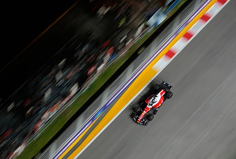 Ferrari driver Charles Leclerc of Monaco steers his car during the qualifying session ahead of the Singapore Formula One Grand Prix in Singapore, Saturday, Oct. 10, 2026. 
