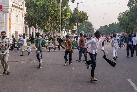 Demonstrators during a protest organised by the Cockroach Janta Party (CJP) demanding the resignation of Chief Election Commissioner (CEC) Gyanesh Kumar over alleged electoral roll irregularities, at Connaught Place, in New Delhi, Saturday, Oct. 10, 2026. 
