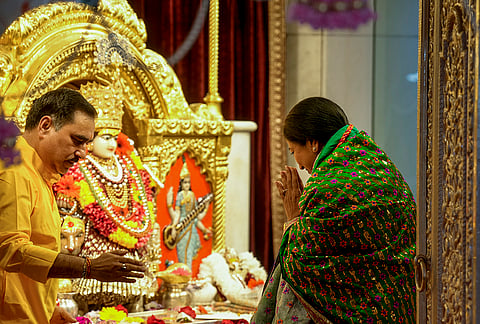 Delhi Chief Minister Rekha Gupta offers prayers at Jhandewalan Temple on the first day of the 'Sharad Navratri' festival, in New Delhi, Sunday, Oct. 11, 2026. 