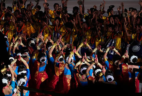 Folk dancers perform during a celebration ahead of Hindu festival Durga Puja, in Kolkata, India, Saturday, Oct. 10, 2026. 
