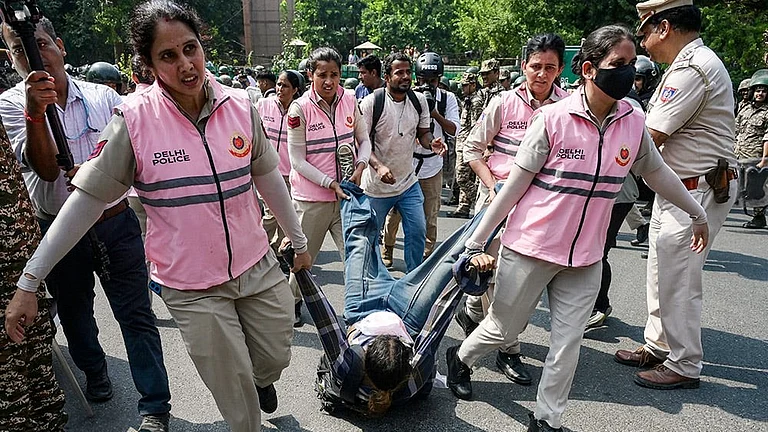 New Delhi: Police personnel detain Cockroach Janta Party (CJP) supporters demonstrating near the Gurudwara Bangla Sahib area ahead of a planned protest against Chief Election Commissioner (CEC) Gyanesh Kumar, in New Delhi, Saturday, Oct. 10, 2026. - | Photo: PTI