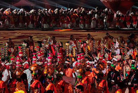 Folk dancers perform during a celebration ahead of Hindu festival Durga Puja, in Kolkata, India, Saturday, Oct. 10, 2026. 
