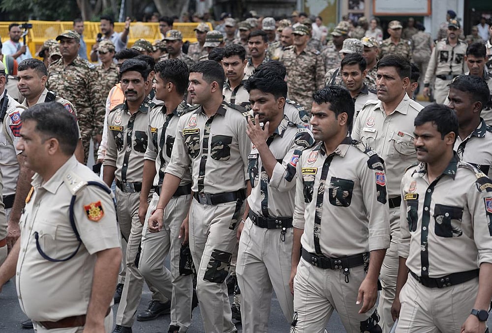 Security personnel keep vigil following continued demonstration calls by the Cockroach Janta Party (CJP) demanding the resignation of Chief Election Commissioner (CEC) Gyanesh Kumar, in New Delhi, Sunday, Oct. 11, 2026. 
