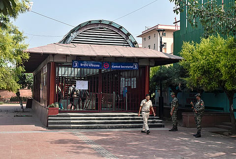 Security personnel stand guard outside the closed entry gates of Central Secretariat Metro station as heavy police deployment and entry restrictions are enforced ahead of a planned protest by Cockroach Janta Party (CJP) members, in New Delhi, Saturday, Oct. 10, 2026. 
