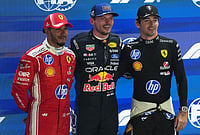 | Photo: AP/Ng Han Guan : Red Bull driver Max Verstappen, center, of the Netherlands flanked by Ferrari driver Lewis Hamilton, left, of Britain and Ferrari driver Charles Leclerc of Monaco after competing in the qualifying session ahead of the Singapore Formula One Grand Prix in Singapore, Saturday, Oct. 10, 2026.