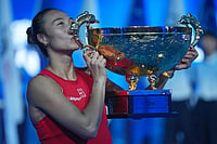 Olympic Champion Zheng Qinwen Claims Maiden WTA 1000 Crown | Photo: AP/Achmad Ibrahim : Zheng Qinwen, of China, kisses the trophy after winning the women's singles final match against a Mirra Andreeva, of Russia at the China Open tennis tournament in Beijing, Sunday, Oct. 11, 2026.