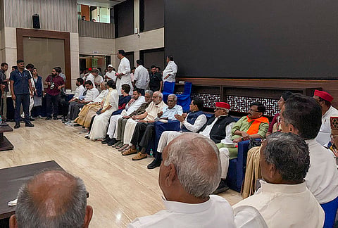 Opposition MPs of the INDIA bloc gather at the Constitution Club of India (CCI) before heading towards Barakhamba road junction to start their "March for Democracy" to the Supreme Court, after which the leaders would file a petition before the court against Chief Election Commissioner Gyanesh Kumar to stop alleged "vote chori", in New Delhi, Monday, Oct. 12, 2026. 
