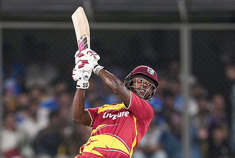 West Indies' Sherfane Rutherford plays a shot during the third T20I cricket match of a series between India and West Indies, in Indore, Madhya Pradesh, Sunday, Oct. 11, 2026. 