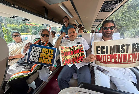 Congress leaders Renuka Chowdhury, Shashi Tharoor and others in a bus as they proceed towards Supreme Court, to file a petition against Chief Election Commissioner Gyanesh Kumar and 'vote chori', at Barakhamba, in New Delhi. 

