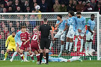 Liverpool Suffer Crushing 0-3 Defeat Against Manchester City After Gravenberch Red Card | Photo: AP/Jon Super : Liverpool's Alexis Mac Allister takes a free kick during the English Premier League soccer match between Liverpool and Manchester City in Liverpool, England, Sunday, Oct. 11, 2026.