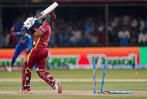 West Indies' captain Shai Hope being bowled by India's Arshdeep Singh during the third T20I cricket match of a series between India and West Indies, in Indore, Madhya Pradesh, Sunday, Oct. 11, 2026. 