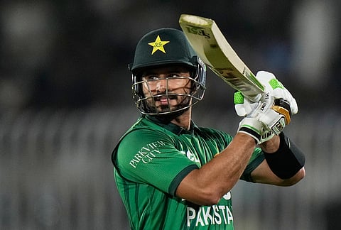 Pakistan's captain Sahibzada Farhan leaves the ground after losing his wicket during the second T20 cricket match between Pakistan and Sri Lanka, in Rawalpindi, Pakistan, Sunday, Oct. 11, 2026. 