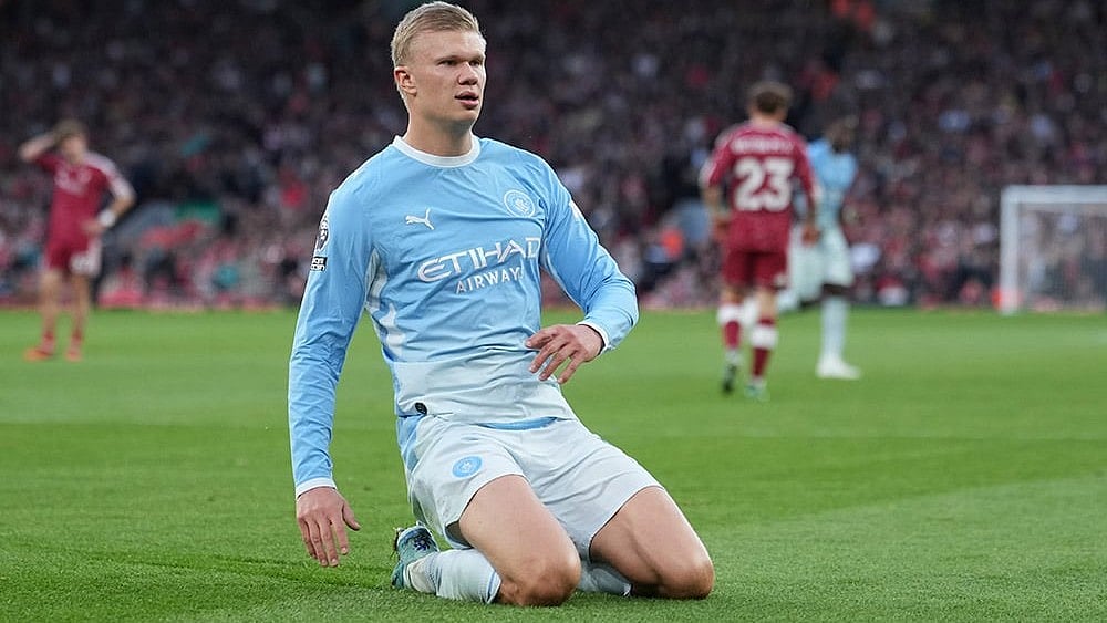 Manchester City's Erling Haaland celebrates after scoring his side's opening goal during the English Premier League soccer match between Liverpool and Manchester City in Liverpool, England, Sunday, Oct. 11, 2026. - | Photo: AP/Jon Super