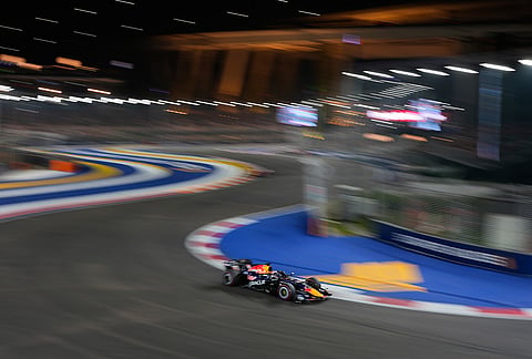 Red Bull driver Max Verstappen of the Netherlands steers his car during the Singapore Formula One Grand Prix race in Singapore, Sunday, Oct. 11, 2026. 