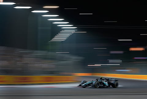 Mercedes driver Andrea Kimi Antonelli of Italy steers his car during the Singapore Formula One Grand Prix race in Singapore, Sunday, Oct. 11, 2026. 
