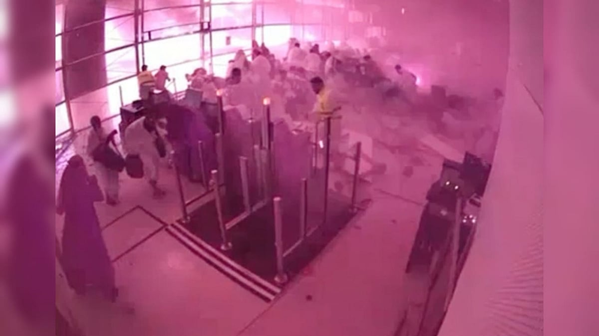 CCTV video released by Saudi Arabia's Media Ministry shows passengers taking cover as flames and smoke fill part of King Khalid International Airport in Riyadh - Saudi Media Ministry via AP