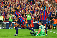 Barcelona Cruise Past Getafe With Dominant Three-Goal Display | Photo: AP/Joan Monfort : Barcelona's Jules Kounde, left, and Barcelona's Eric Garcia, right, celebrate after scoring during the Spanish La Liga soccer match between Barcelona and Getafe in Barcelona, Spain, Saturday, Oct. 10, 2026.