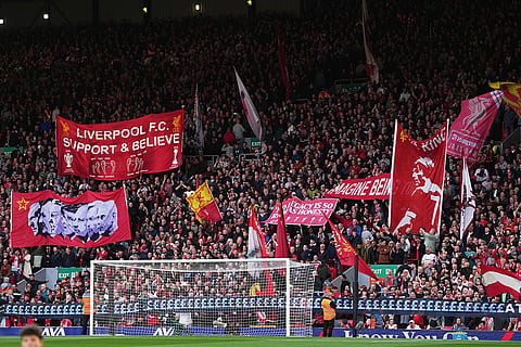Liverpool fans display banners prior to the English Premier League soccer match between Liverpool and Manchester City in Liverpool, England, Sunday, Oct. 11, 2026.