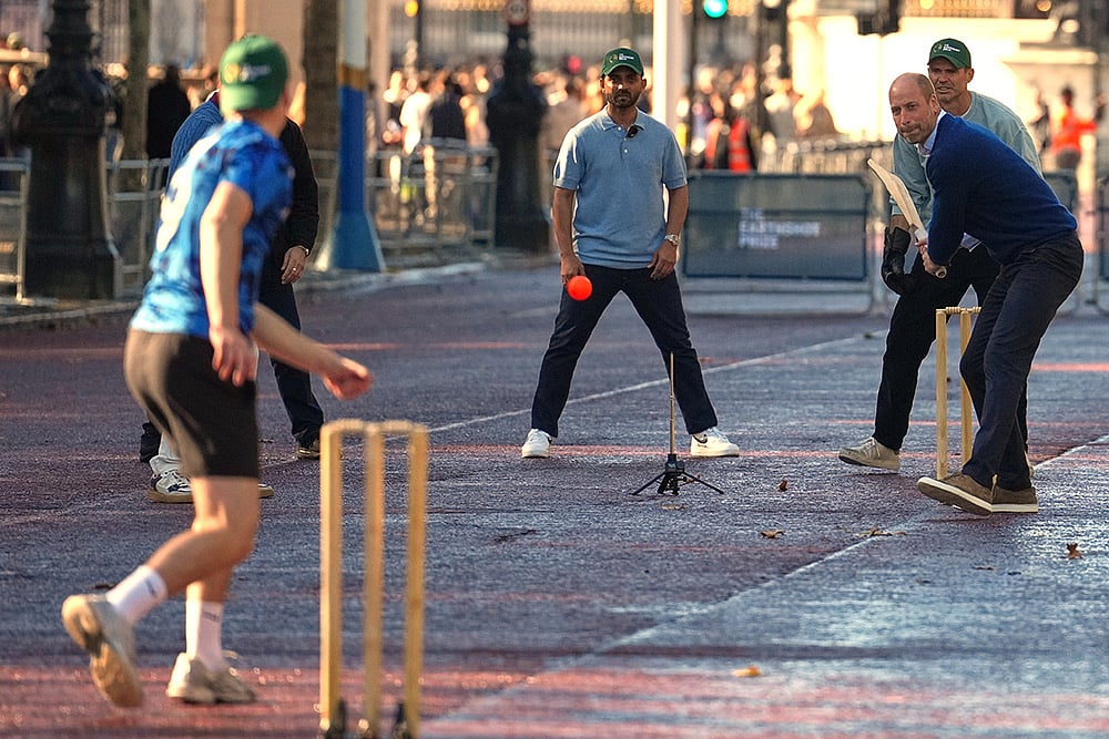 Prince William bats with cricket bat