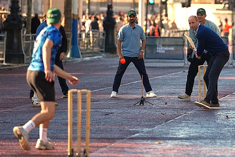 Britain's Prince William bats as he joins cricketing stars from the United Kingdom and India at a special Earthshot Prize event called 'Cricket at the Mall' in London, Tuesday, Oct. 13, 2026, ahead of the Earthshot Prize's annual Summit and Awards Night in Mumbai in November.