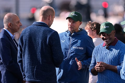 Britain's Prince William speaks to Cricket player Joe Root and Brian Lara, right, as he joins cricketing stars from the United Kingdom and India at a special Earthshot Prize event in London, Tuesday, Oct. 13, 2026, ahead of the Earthshot Prize's annual Summit and Awards Night in Mumbai in November.