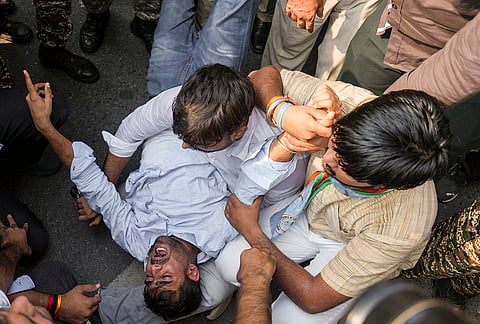 National Students' Union of India (NSUI) activists during a protest demanding immediate resignation of Chief Election Commissioner (CEC) Gyanesh Kumar, at Connaught Place, in New Delhi, Tuesday, Oct. 13, 2026. 
