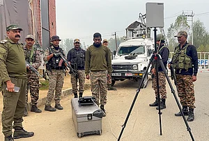| Photo: PTI : CRPF personnel conduct area surveillance using a drone to ensure security, in Anantnag.