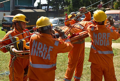 NDRF personnel conduct a mock drill under the “National Security and Self-Reliance Resolution Week”, in Guwahati.
