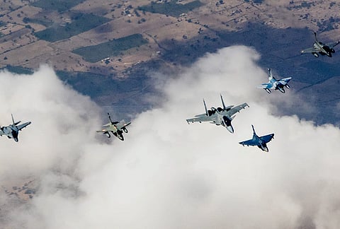 IAF chief Air Chief Marshal A P Singh during his last fighter jet sortie aboard an indigenous Tejas aircraft accompanied by other aircrafts during Exercise Tarang Shakti at Jodhpur Air Force Station, in Rajasthan. 
