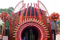 | Photo: PTI/Swapan Mahapatra : A worker decorates a community Durga Puja pandal ahead of the festival, in Kolkata, West Bengal, Tuesday, Oct. 13, 2026. 