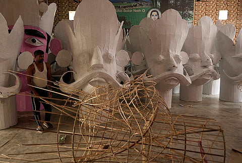 An artist makes effigies of Ravana, Meghnath and Kumbhkaran, characters in the Hindu epic Ramayana, in preparation for the upcoming Dussehra festival in Jammu, India, Saturday, Oct. 10, 2026. 
