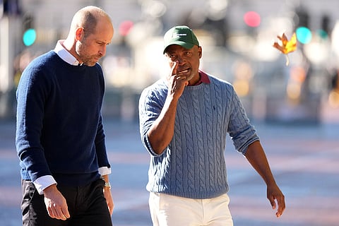 Britain's Prince William chats with Cricket player Brian Lara as he joins cricketing stars from the United Kingdom and India at a special Earthshot Prize event called 'Cricket at the Mall' in London, Tuesday, Oct. 13, 2026, ahead of the Earthshot Prize's annual Summit and Awards Night in Mumbai in November.